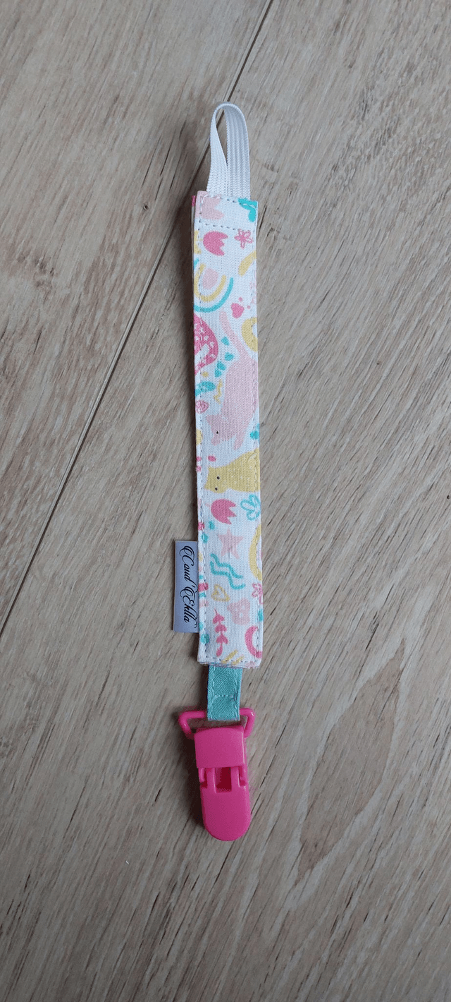 Attache sucette chat rose