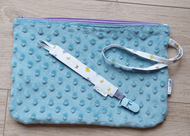 Trousse souple turquoise papillons